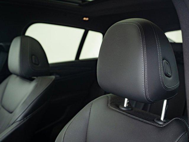 Photo of 2024 Carbon Black Metallic BMW X4