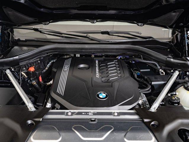 Photo of 2024 Carbon Black Metallic BMW X4