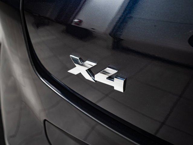 Photo of 2024 Carbon Black Metallic BMW X4