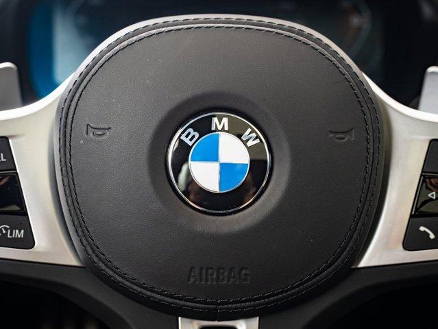 Photo of 2024 Carbon Black Metallic BMW X4