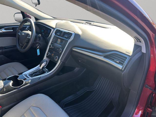 Photo of 2015 Ruby Red Tinted Clearcoat Ford Fusion