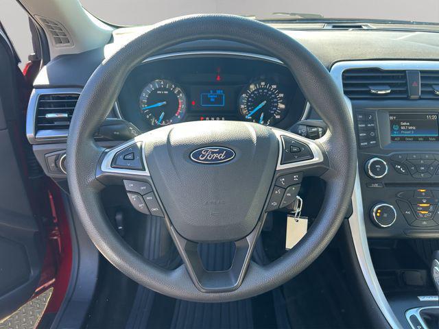 Photo of 2015 Ruby Red Tinted Clearcoat Ford Fusion