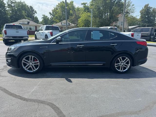 Photo of 2013 Ebony Black Kia Optima