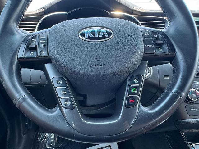 Photo of 2013 Ebony Black Kia Optima