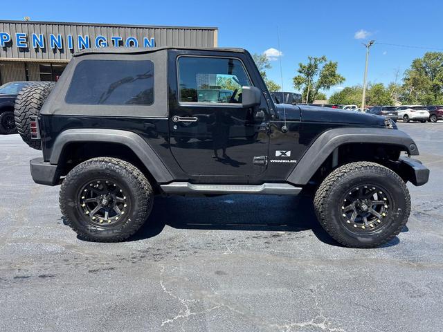Photo of 2007 Black Clearcoat Black Soft Top Jeep Wrangler