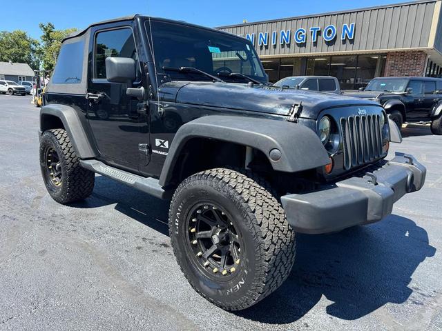 Photo of 2007 Black Clearcoat Black Soft Top Jeep Wrangler