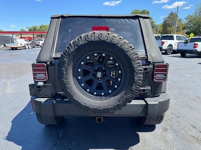Photo of 2007 Black Clearcoat Black Soft Top Jeep Wrangler