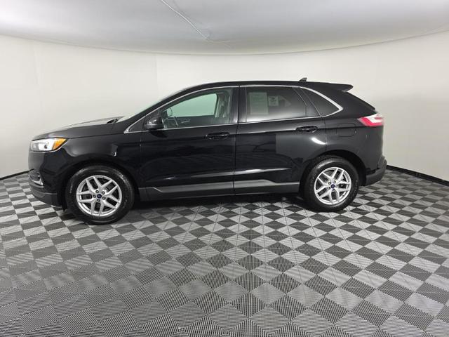 Photo of 2021 Agate Black Metallic Ford Edge