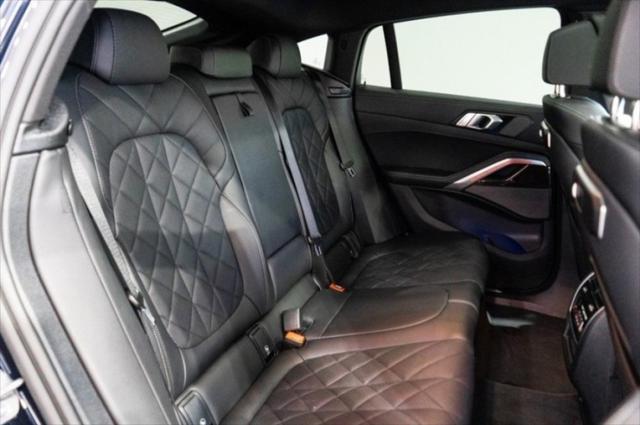 Photo of 2024 Carbon Black Metallic BMW X6