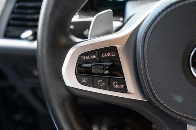 Photo of 2024 Carbon Black Metallic BMW X6
