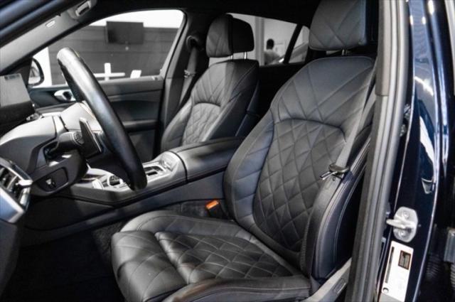 Photo of 2024 Carbon Black Metallic BMW X6