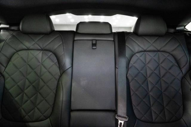 Photo of 2024 Carbon Black Metallic BMW X6