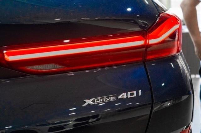 Photo of 2024 Carbon Black Metallic BMW X6