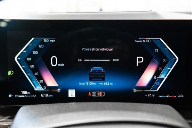 Photo of 2024 Carbon Black Metallic BMW X6