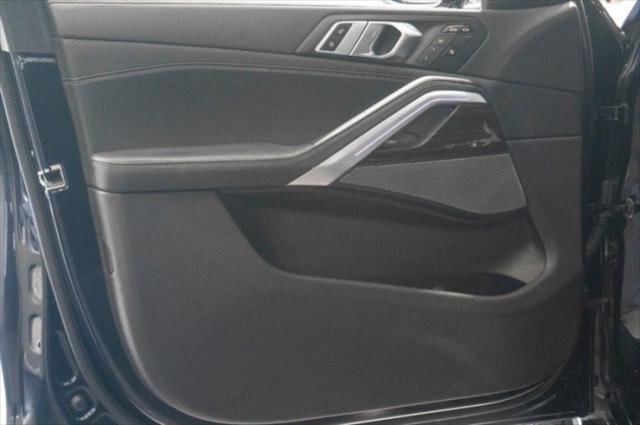 Photo of 2024 Carbon Black Metallic BMW X6