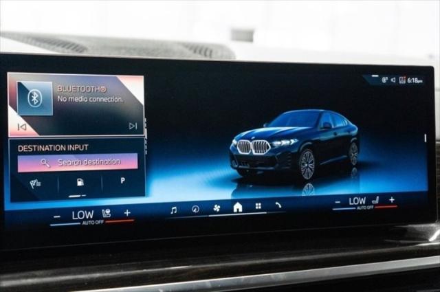 Photo of 2024 Carbon Black Metallic BMW X6
