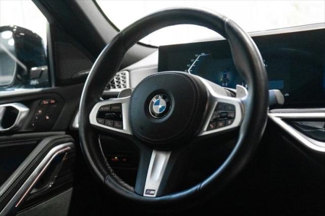 Photo of 2024 Carbon Black Metallic BMW X6