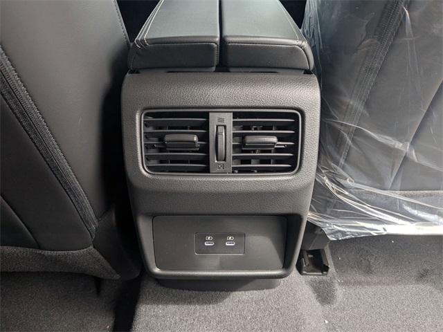 Photo of 2025 2t Chpn Blk Roo Nissan Rogue