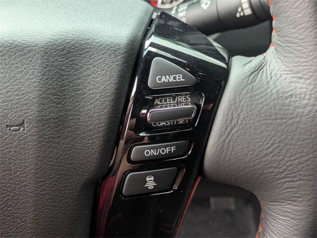 Photo of 2025 Afterburn Orang Nissan Frontier