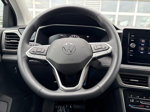 Photo of 2025 Pure White W/Deep Black Roof Volkswagen Taos