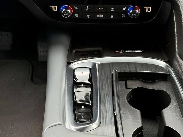 Photo of 2024 Cherry Red Tintcoat Buick Enclave
