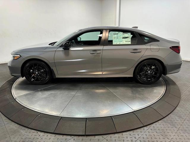 Photo of 2025 Urban Gray Pearl Honda Civic Hybrid