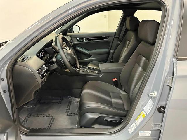 Photo of 2025 Urban Gray Pearl Honda Civic Hybrid