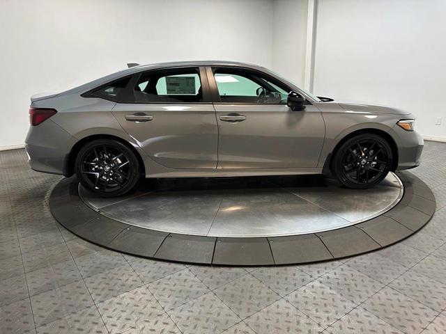 Photo of 2025 Urban Gray Pearl Honda Civic Hybrid