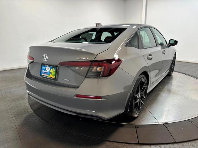 Photo of 2025 Urban Gray Pearl Honda Civic Hybrid
