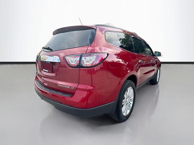 Photo of 2014 Crystal Red Tintcoat Chevrolet Traverse