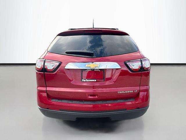 Photo of 2014 Crystal Red Tintcoat Chevrolet Traverse