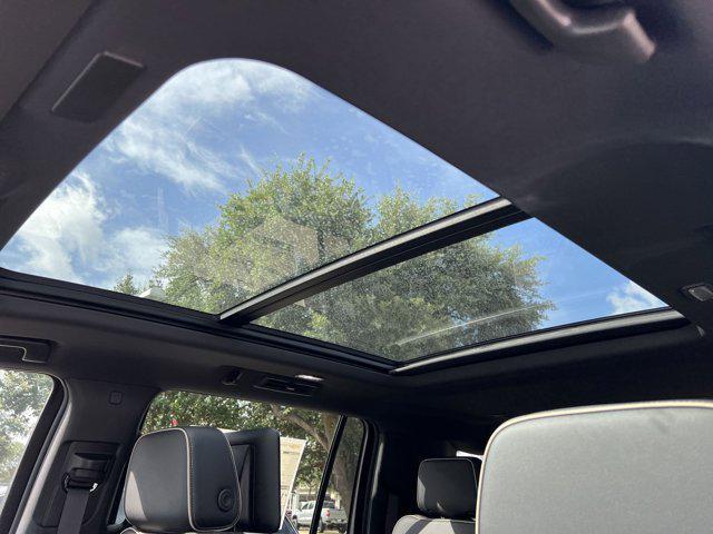 Photo of 2025 Radiant Red Tintcoat Chevrolet Suburban