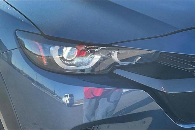 Photo of 2025 Ingot Blue Metallic Mazda CX-50