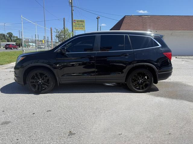 Photo of 2016 Crystal Black Pearl Honda Pilot