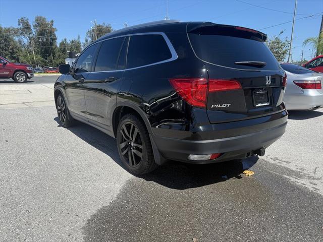 Photo of 2016 Crystal Black Pearl Honda Pilot