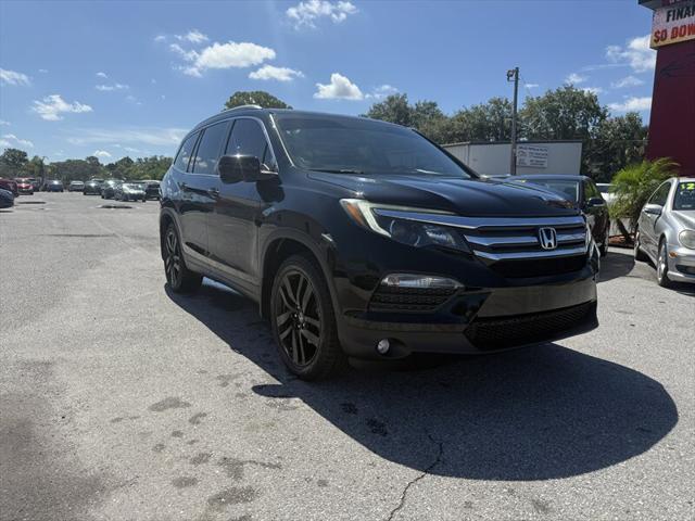 Photo of 2016 Crystal Black Pearl Honda Pilot