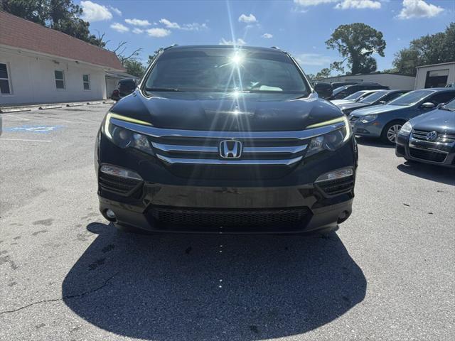Photo of 2016 Crystal Black Pearl Honda Pilot