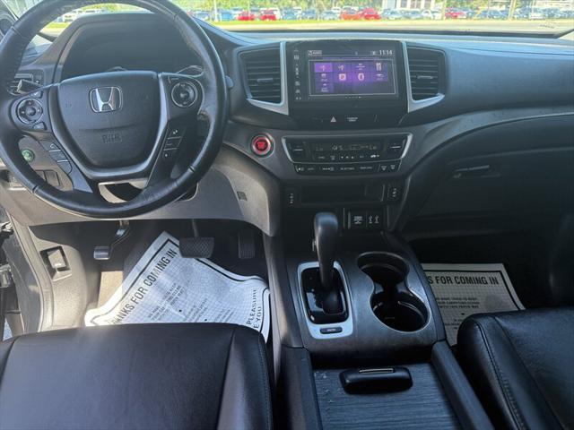 Photo of 2016 Crystal Black Pearl Honda Pilot