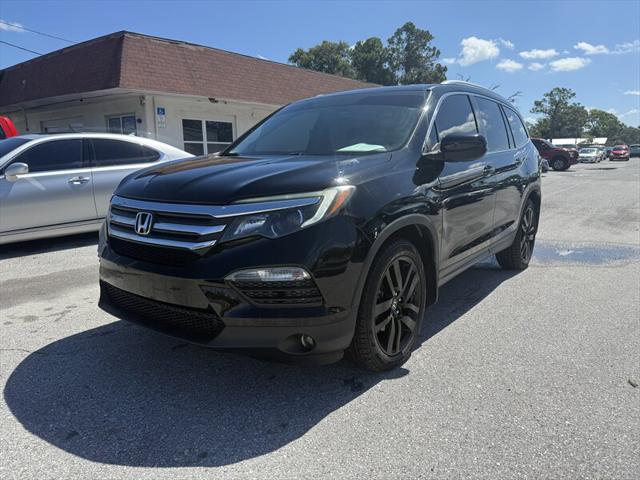Photo of 2016 Crystal Black Pearl Honda Pilot