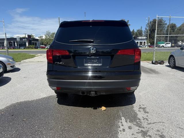 Photo of 2016 Crystal Black Pearl Honda Pilot