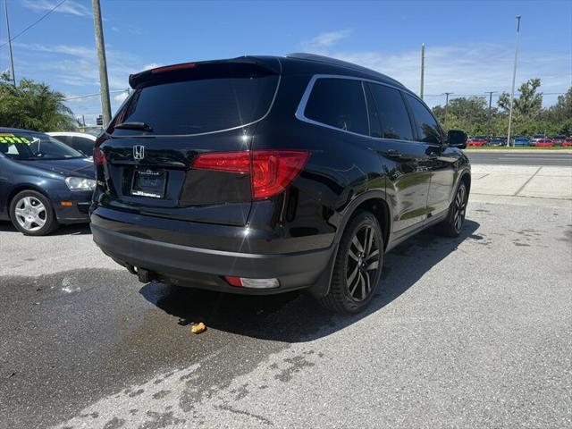 Photo of 2016 Crystal Black Pearl Honda Pilot