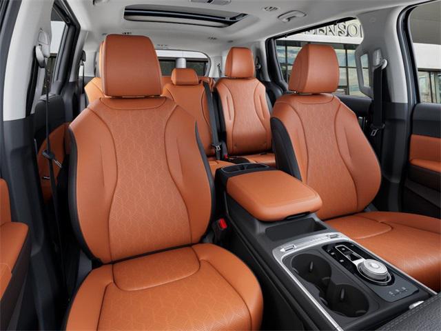 Photo of 2026 Astra Blue Kia Carnival Hybrid