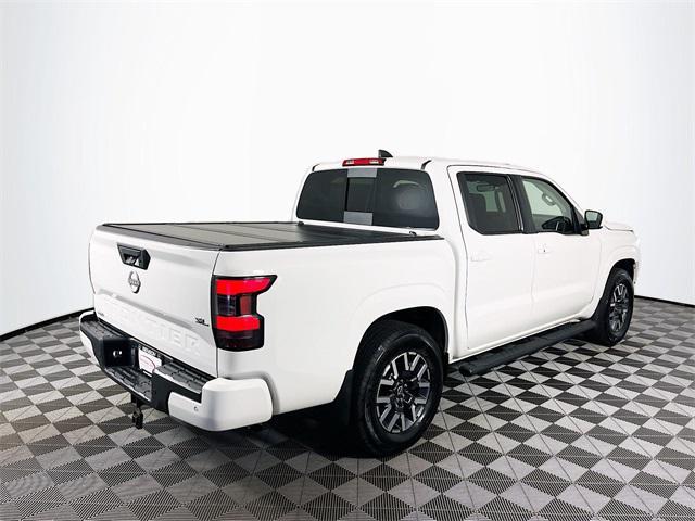 Photo of 2024 Glacier White Nissan Frontier