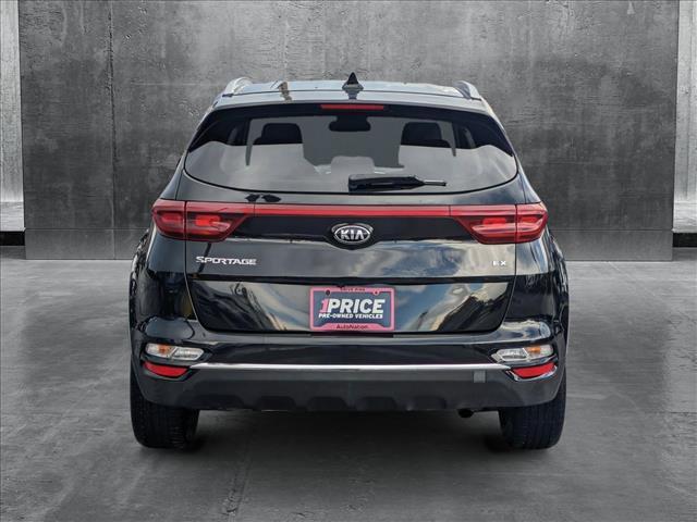 Photo of 2021 Black Cherry Kia Sportage