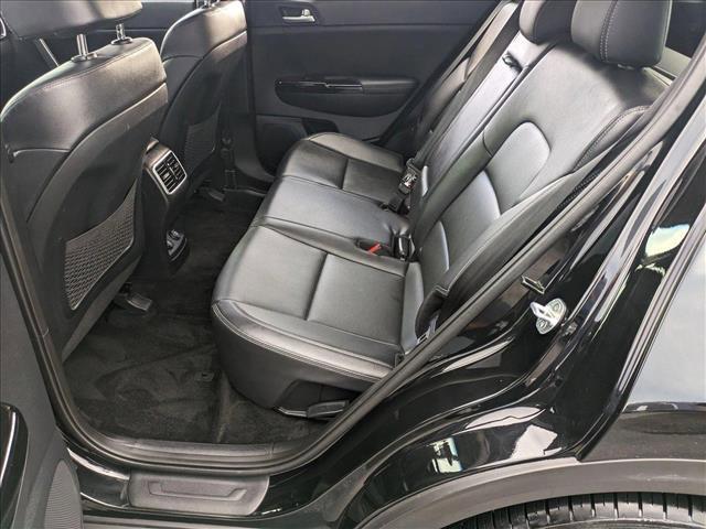 Photo of 2021 Black Cherry Kia Sportage