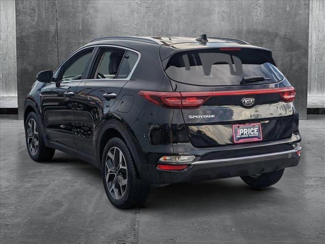 Photo of 2021 Black Cherry Kia Sportage