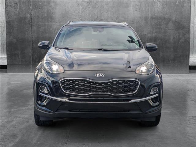 Photo of 2021 Black Cherry Kia Sportage