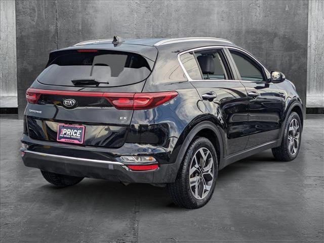 Photo of 2021 Black Cherry Kia Sportage