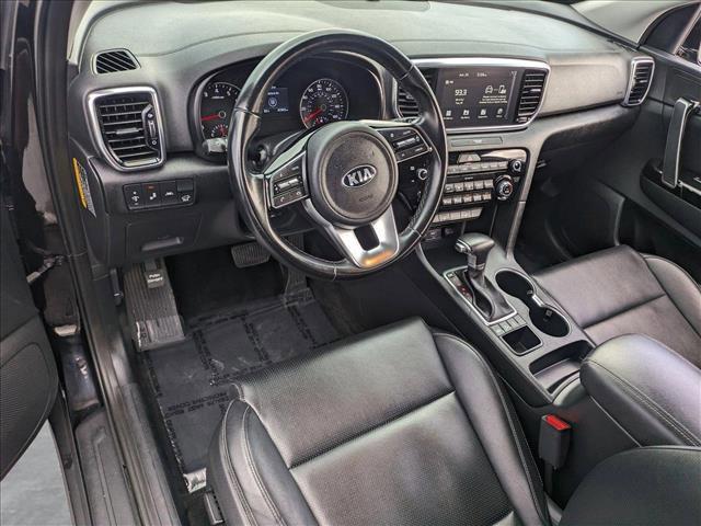 Photo of 2021 Black Cherry Kia Sportage