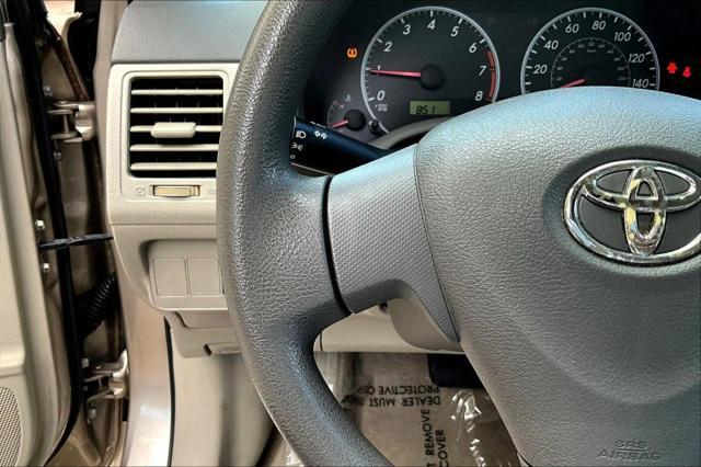 Photo of 2009 Gold Toyota Corolla